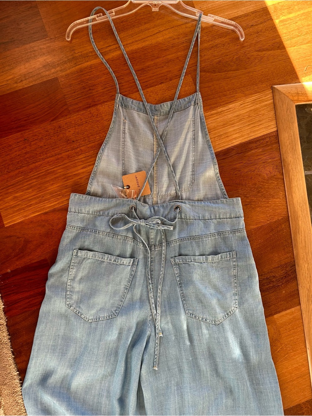 NEW w/ tags!
Blu Pepper Light Blue Wide-Leg Denim Jumpsuit with Spaghetti Straps - Picture 3 of 6